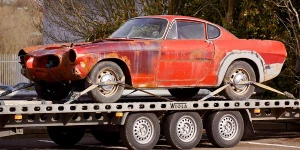 Cash For Car Team Towing a Junk Car